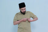 Person adjusting a Retrocombat t-shirt sleeve, emphasizing comfort and fit.