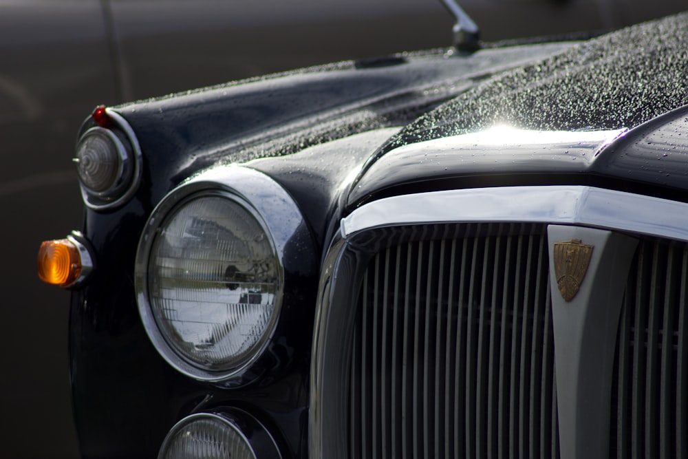 a close up of the front of a black car