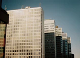 A panoramic view of a premium commercial office complex with glass facades.