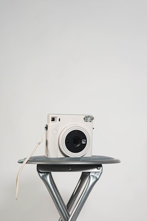 Black and white promotional products arranged on a minimalist table.