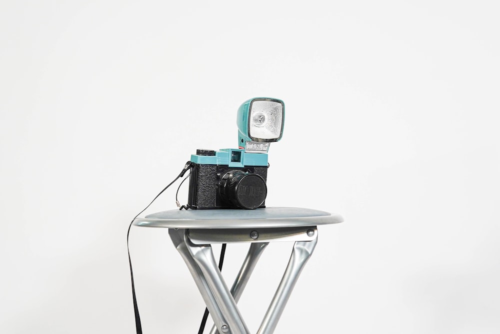a camera sitting on top of a table
