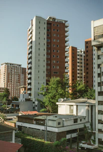a group of tall buildings next to each other