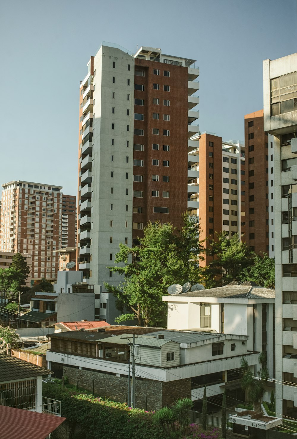 a group of tall buildings next to each other