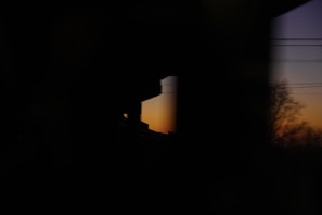 Evening shot of solar panels silhouetted against a fading sunset, highlighting their structure