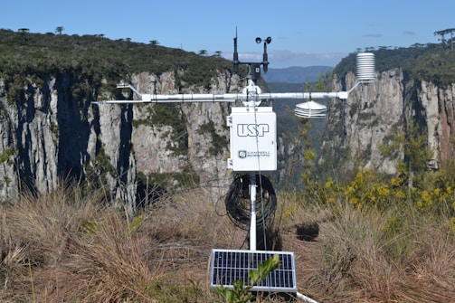 a solar panel on top of a mountain
