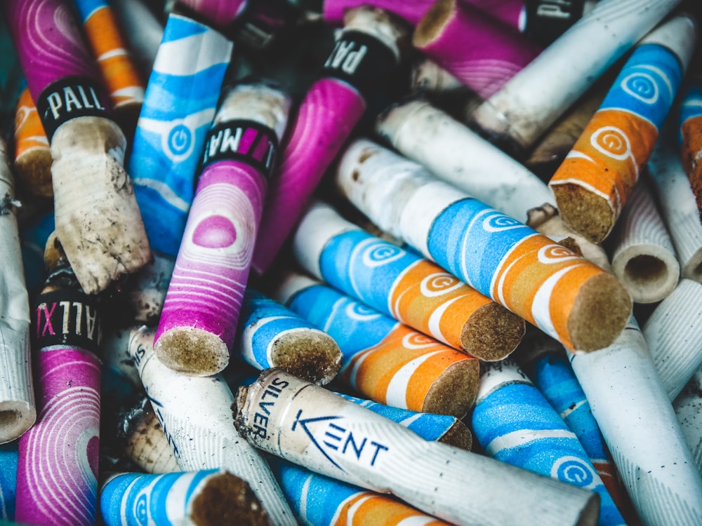 a pile of colorful crayons sitting next to each other