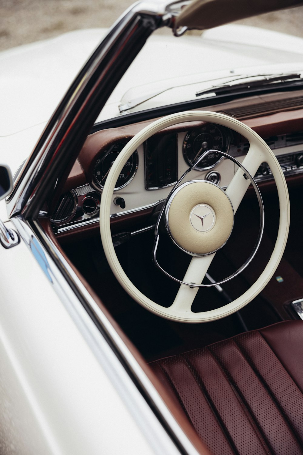 the interior of a car with a steering wheel