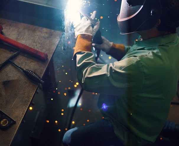 a welder working on a piece of metal