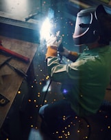 a welder working on a piece of metal