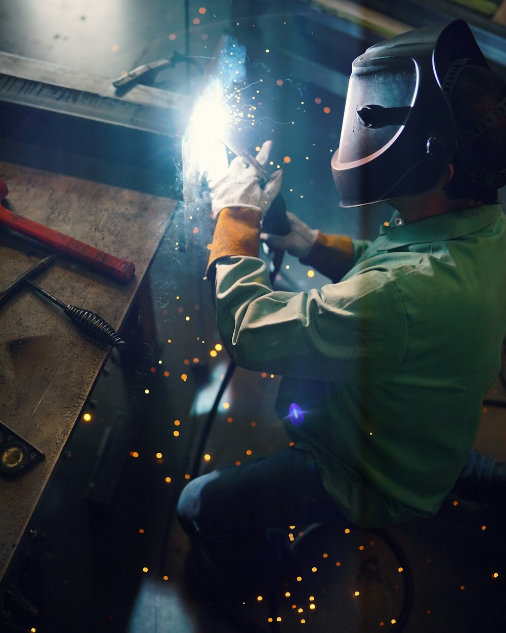 a welder working on a piece of metal