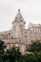 a large building with a clock on the top of it