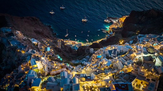 an aerial view of a city at night