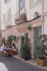 Cozy café terrace with people chatting and enjoying coffee in Reus