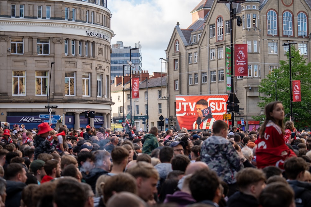 a large crowd of people in a city