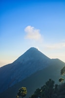 Majestic view of the Cotopaxi volcano with a clear blue sky.