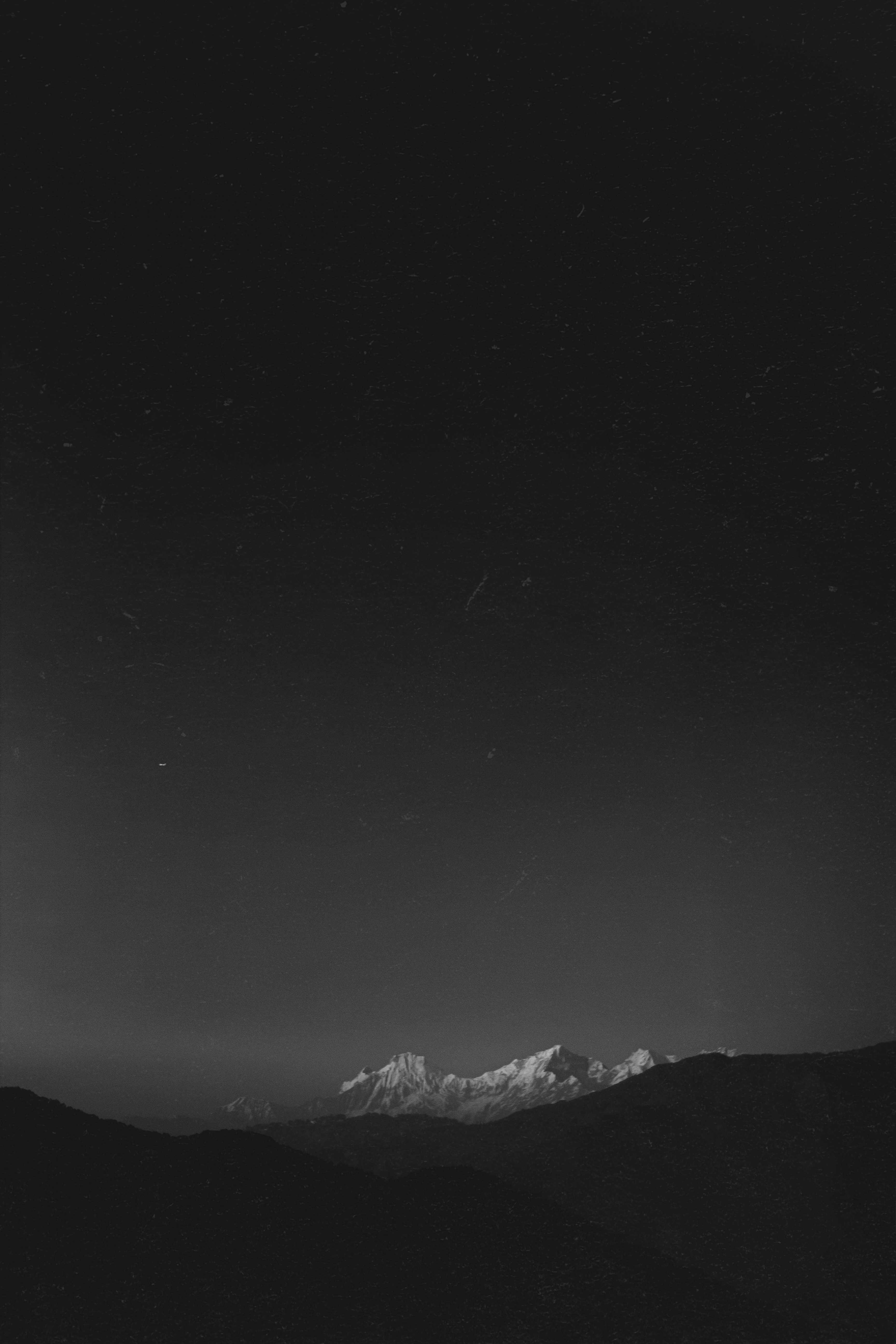 A black and white photo of a mountain range photo – Free Mountains ...