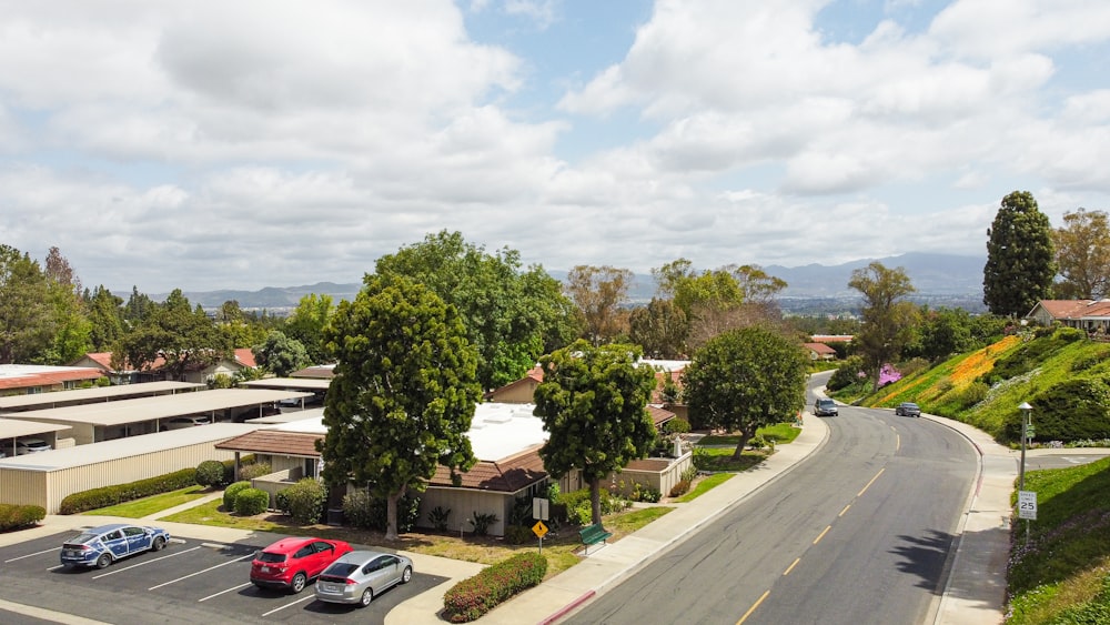 a street with cars parked on both sides of it