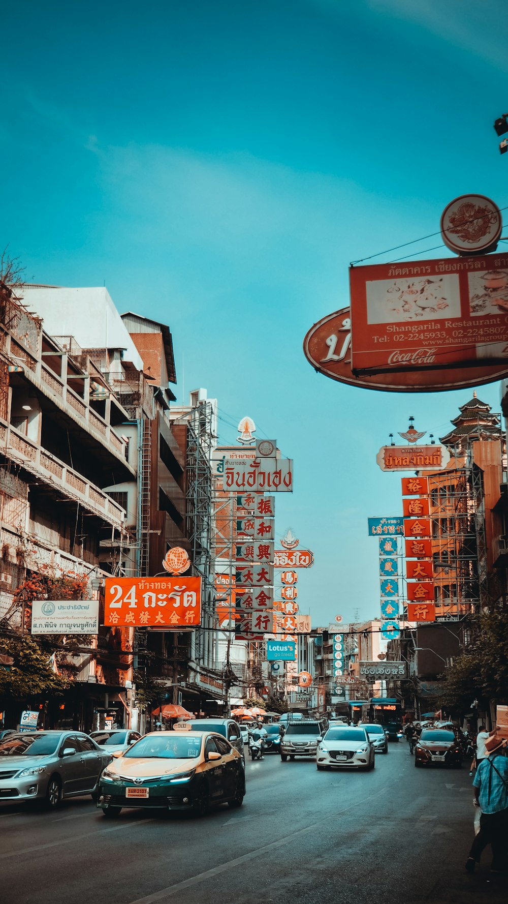 a city street filled with lots of traffic