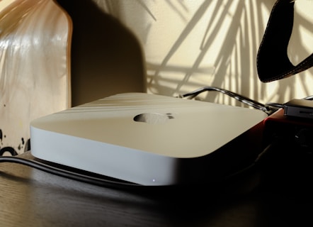 a computer mouse sitting on top of a wooden table