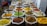 A vibrant display of various spices offered by grenier de kly.