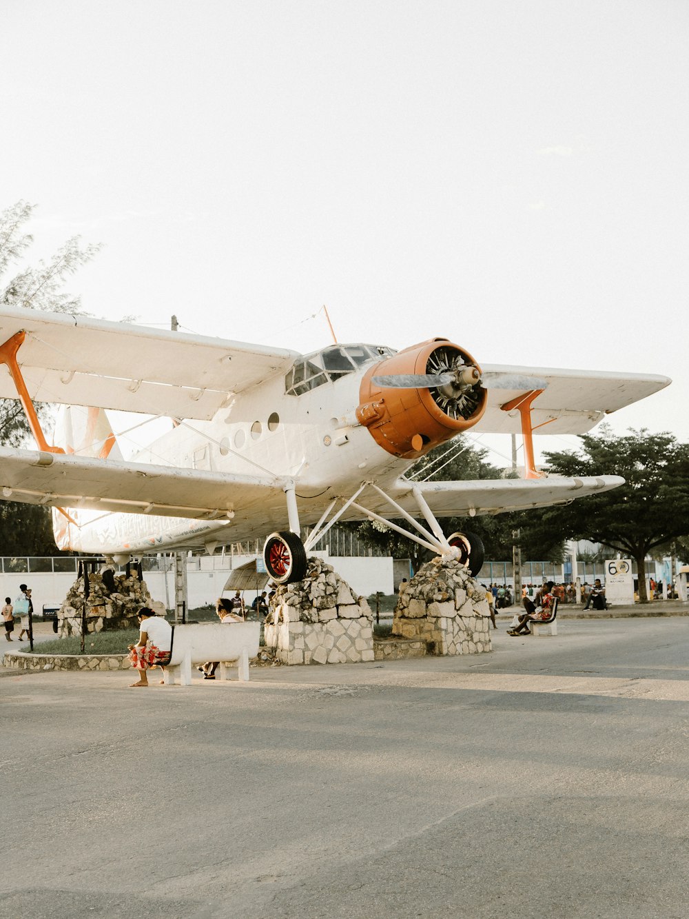 a small airplane parked on top of a tarmac