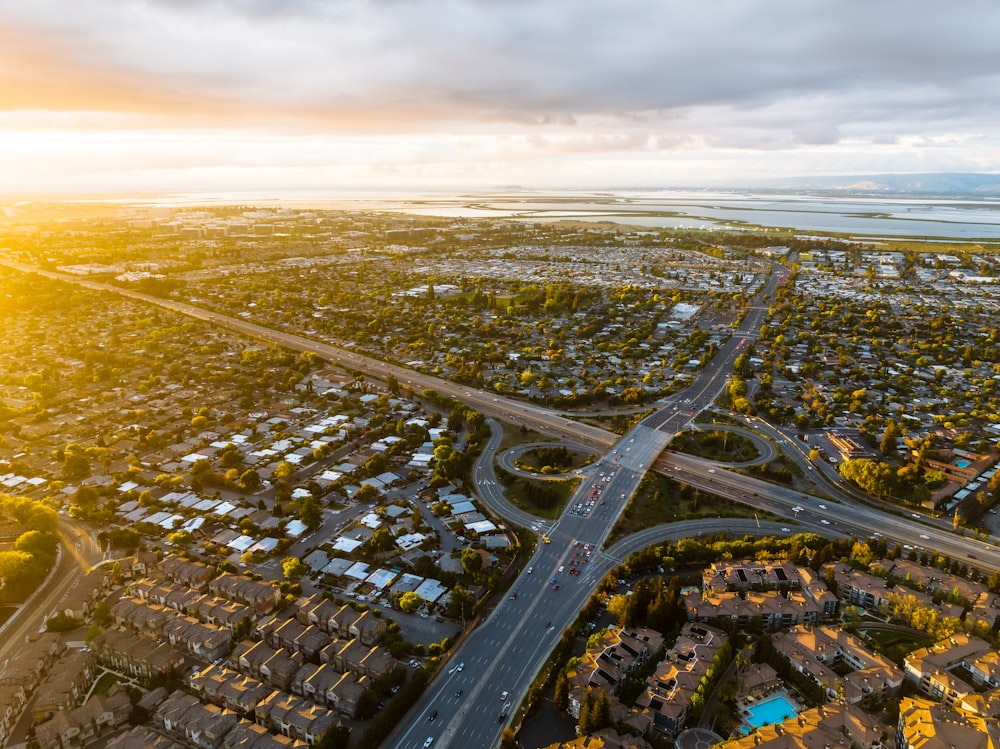 an aerial view of a highway intersection in a city