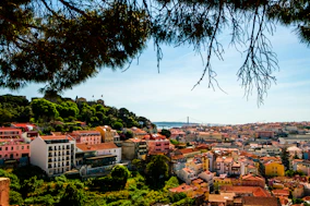 a view of a city from a hill