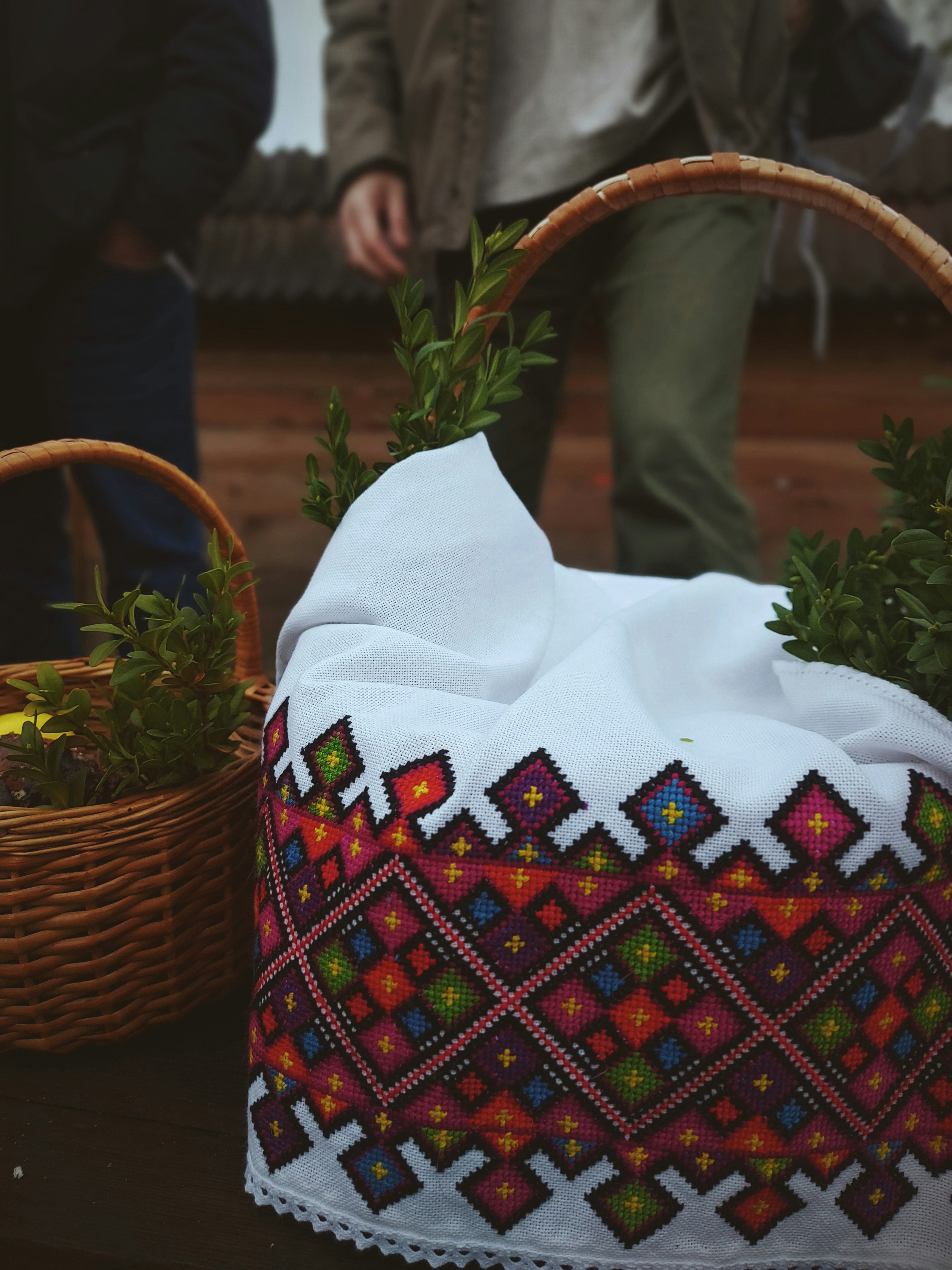 a basket with a white cloth on top of it