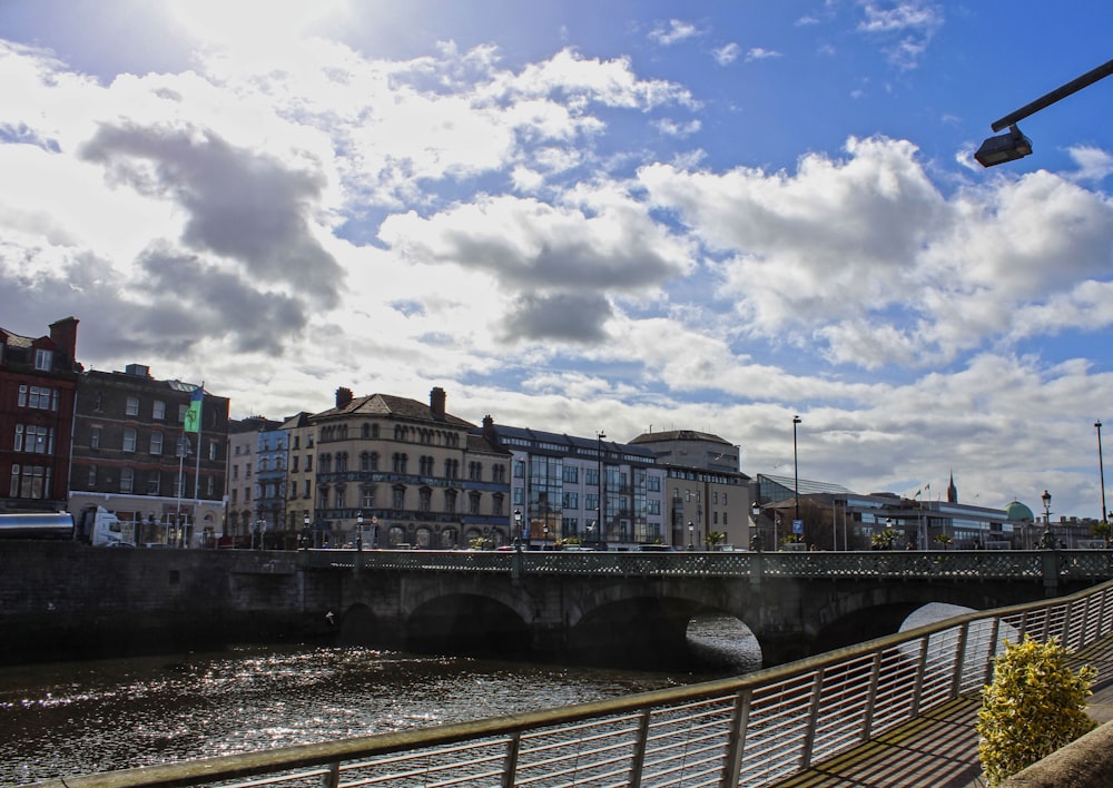 a bridge over a river in a city