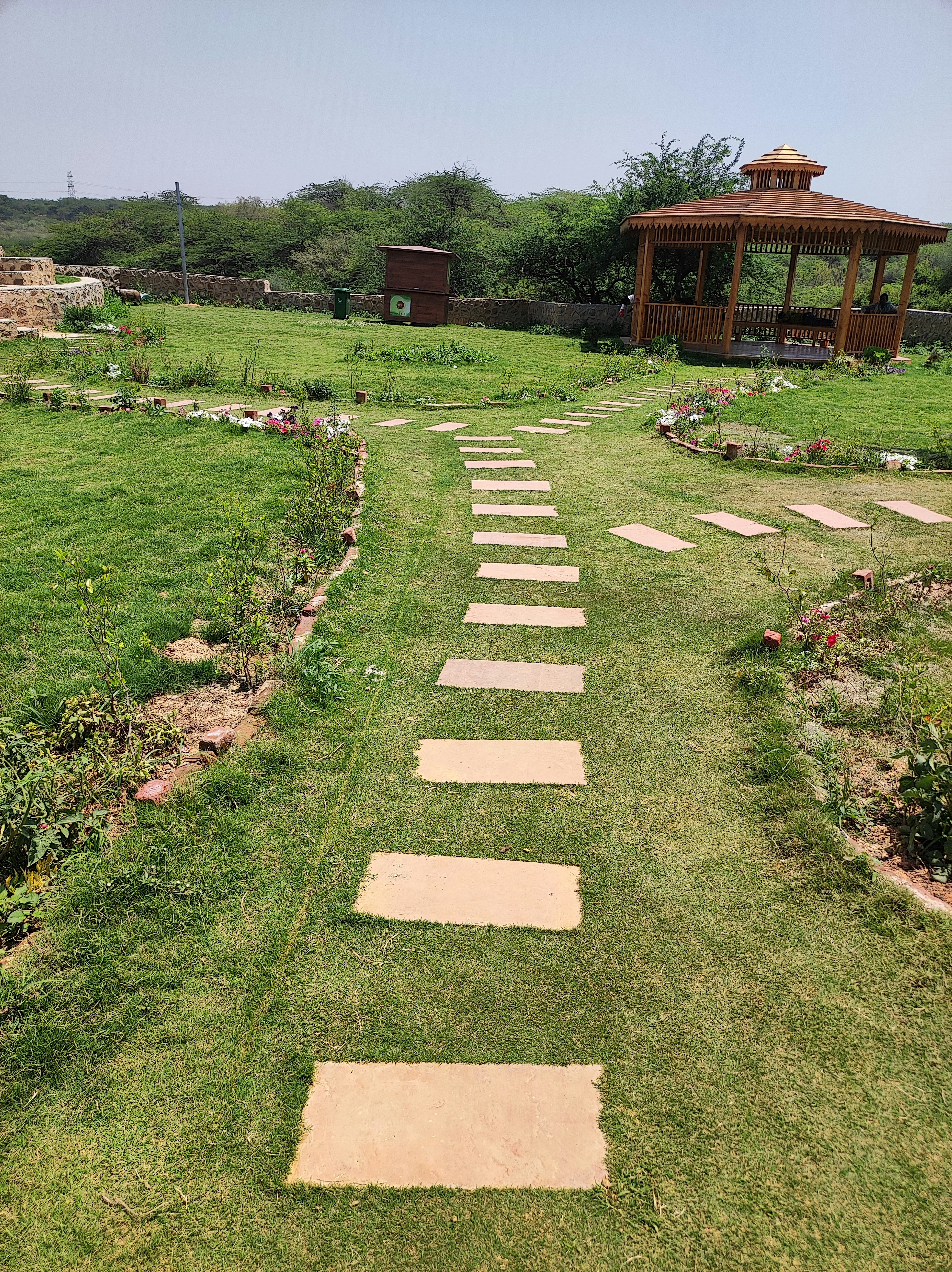 a set of stone steps leading to a gazebo