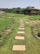 a set of stone steps leading to a gazebo