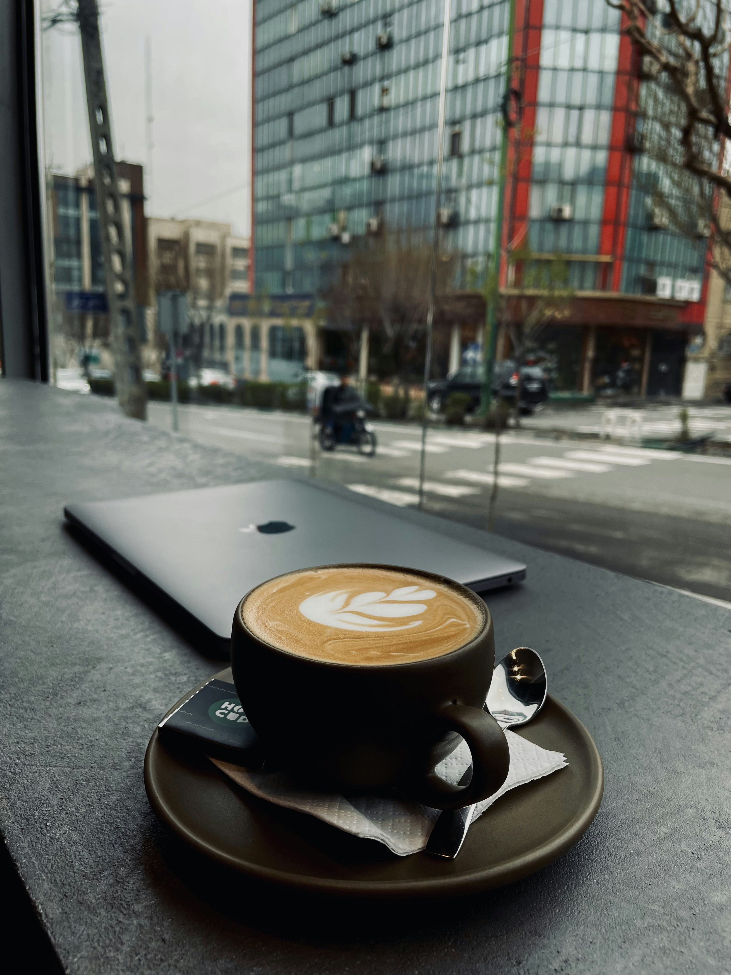 a cup of coffee sitting on top of a saucer