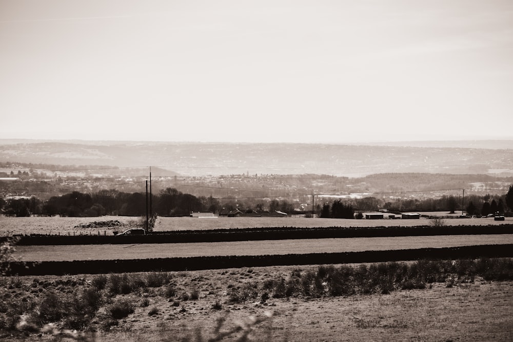 a black and white photo of a rural landscape