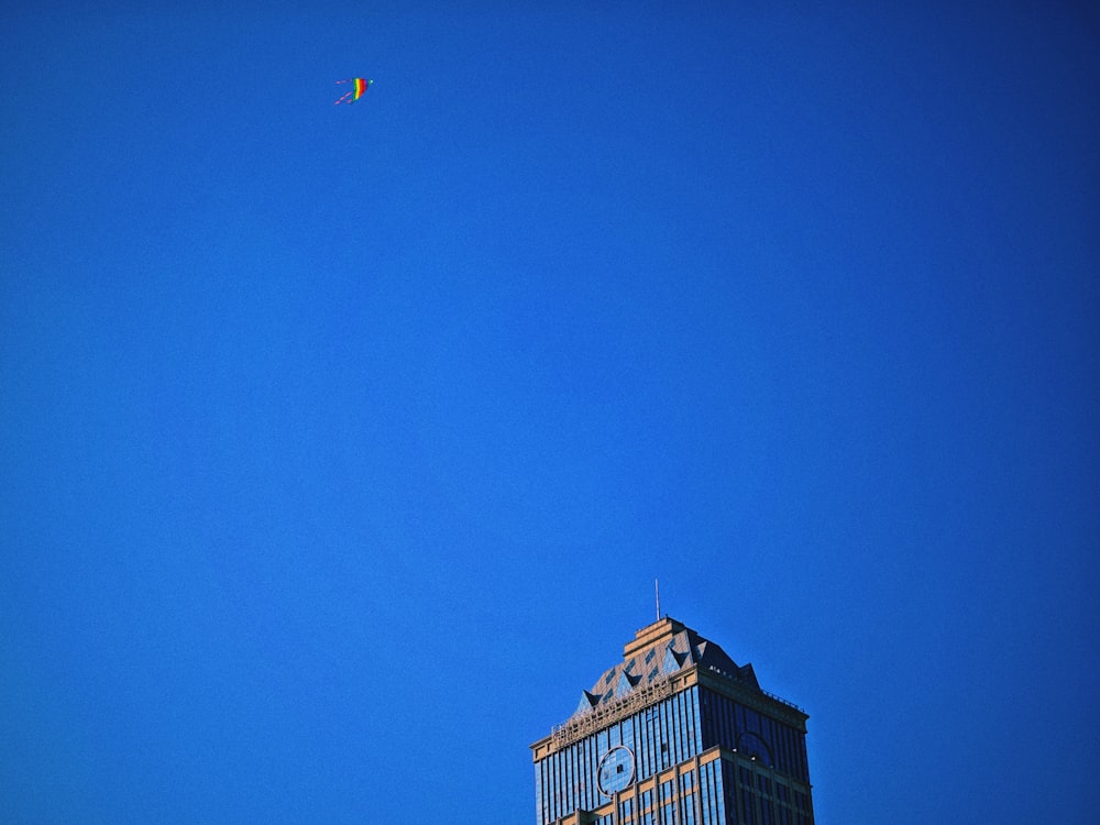 a tall building with a clock on the side of it