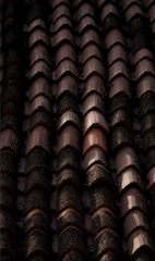 Rows of sturdy roofing tiles drying under the bright Ghanaian sun at the factory.