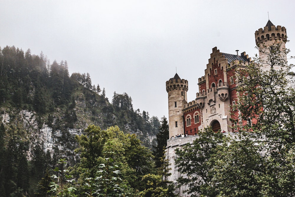 a castle with a clock on the side of it