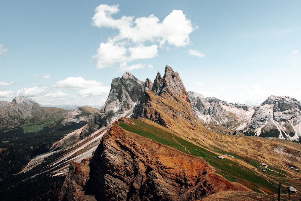 a view of a mountain range from the top of a mountain