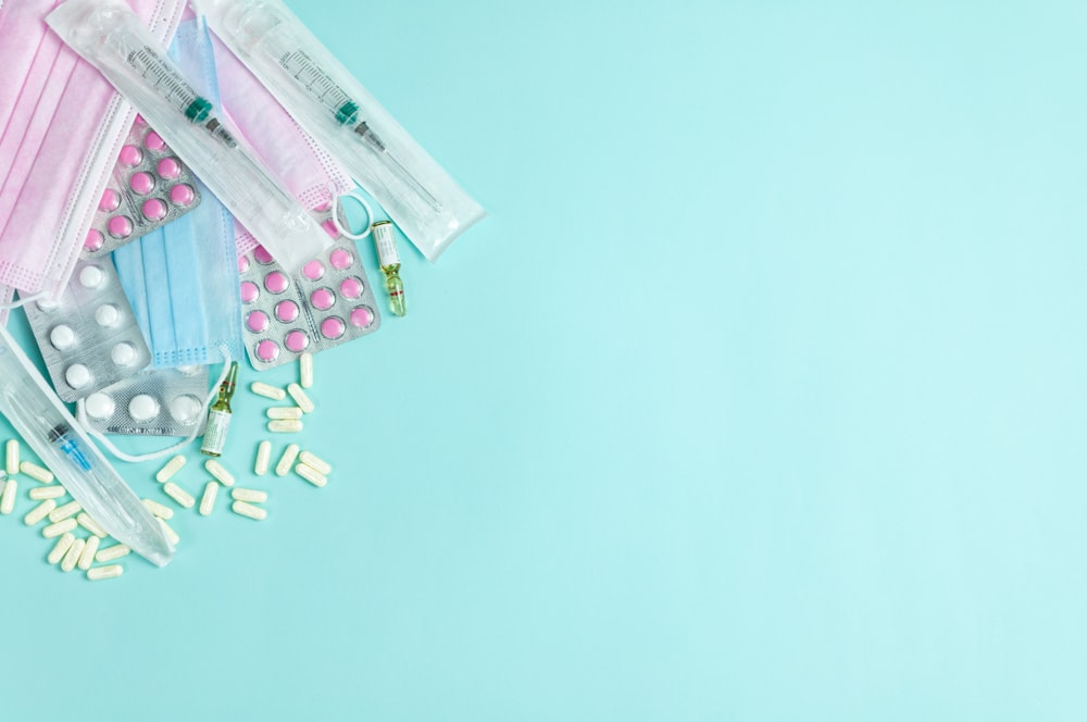 a group of medical supplies on a blue background