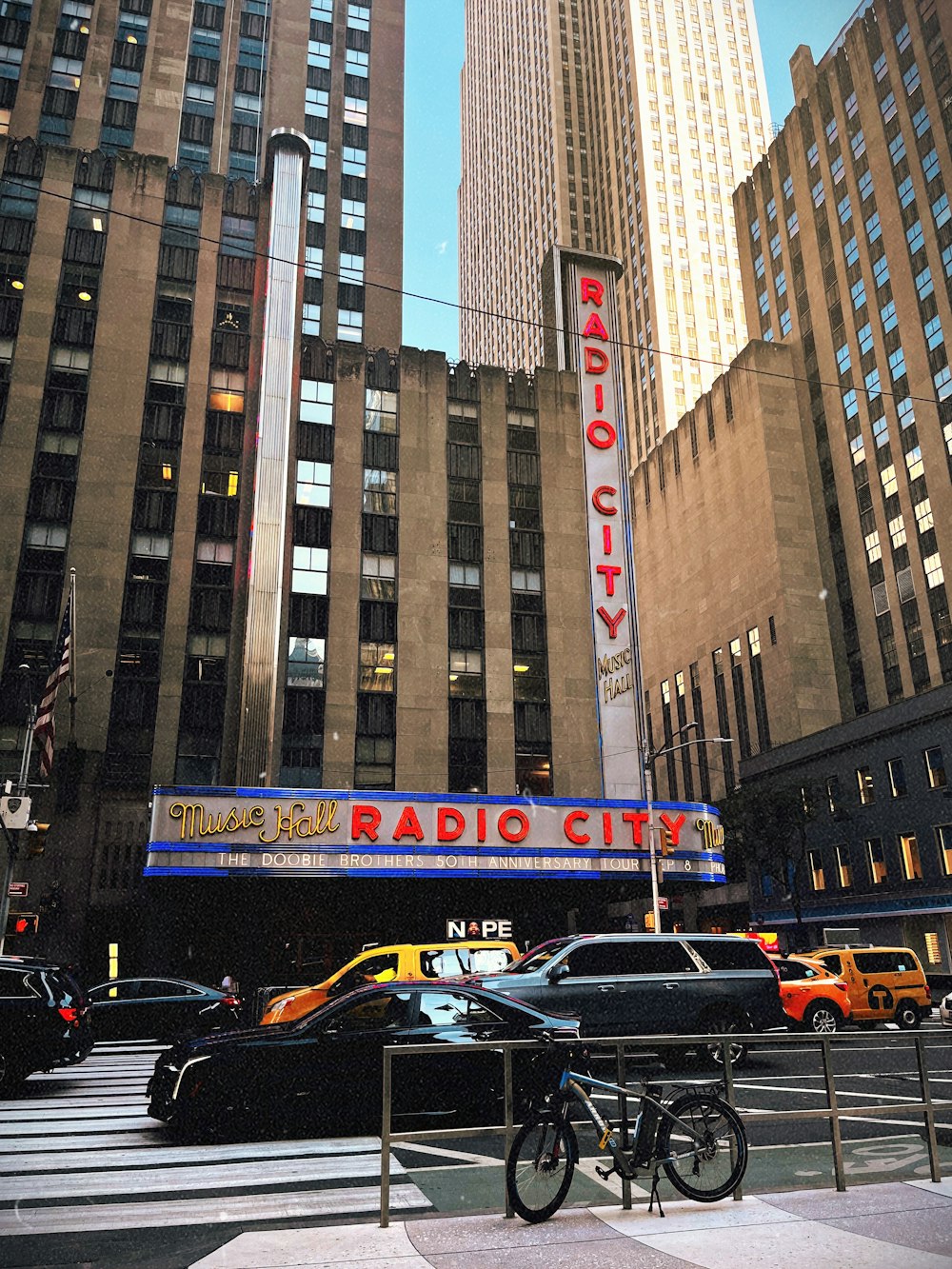 the radio city radio city sign is lit up