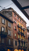 Street view of a row of mixed-use buildings in central Birmingham.