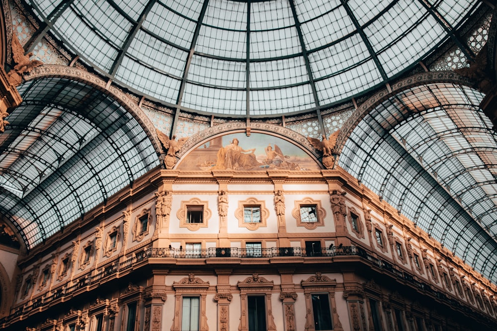 the inside of a building with a glass ceiling