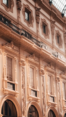 Historic building facade with detailed architectural features under natural light.