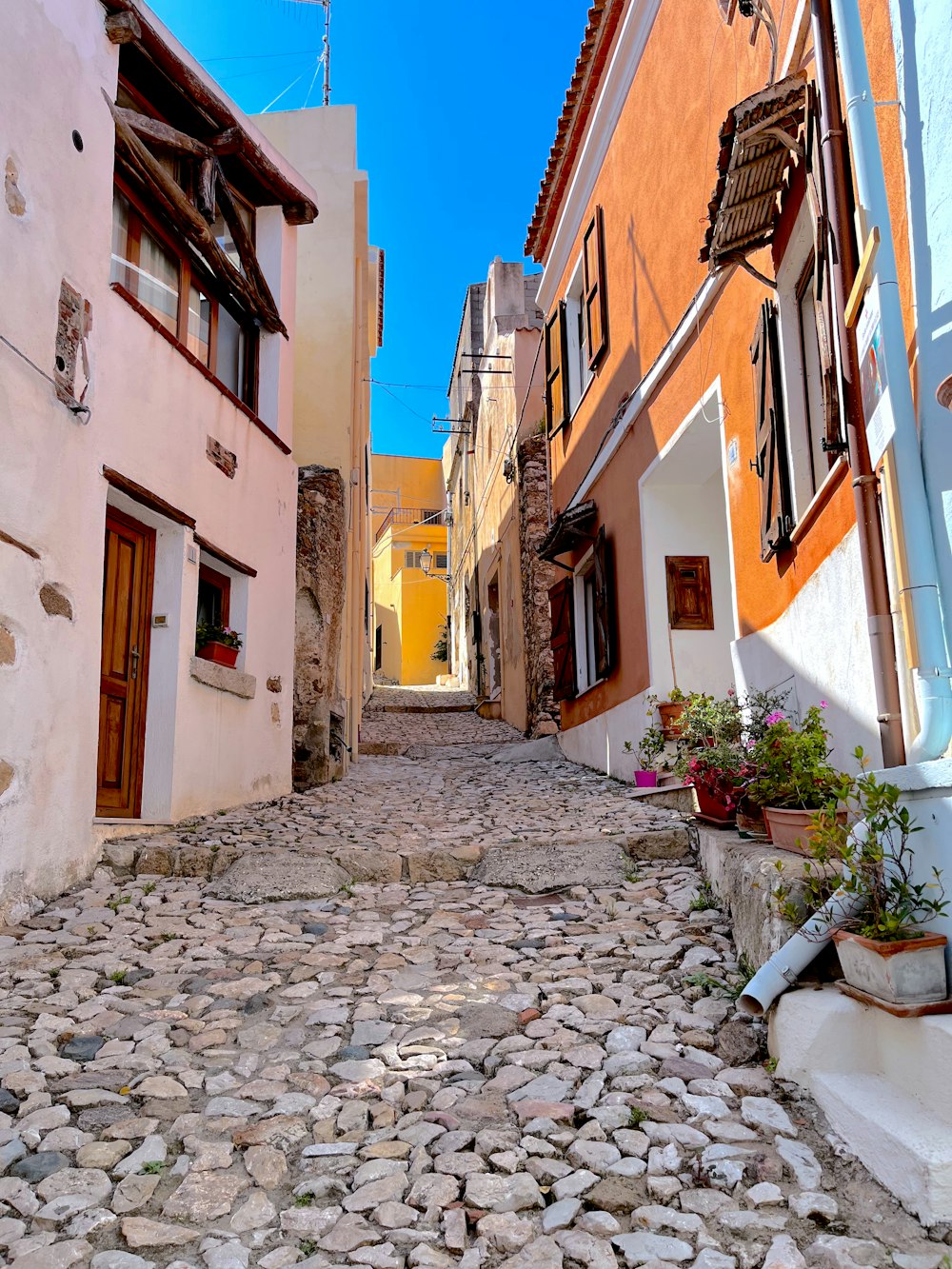 a cobblestone street in a small town