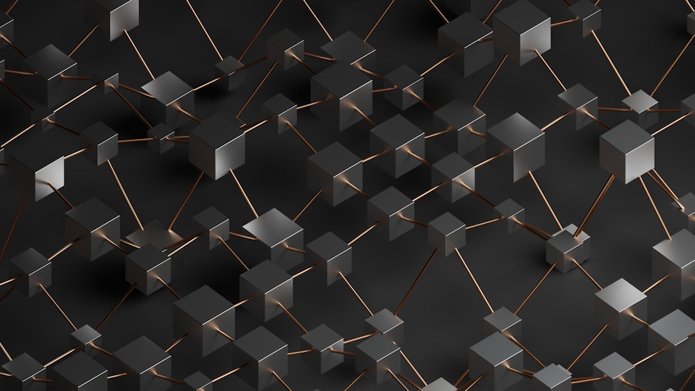 a black background with a bunch of metallic squares