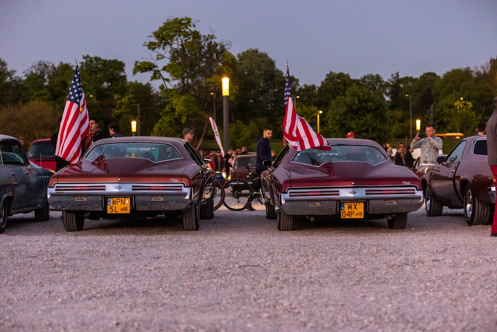 a group of cars parked next to each other in a parking lot