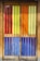 A set of wooden doors featuring vertical slats of colorful stained glass panels. The glass sections include rich hues of red, yellow, orange, and blue, creating a vibrant and eye-catching effect. The wooden frame has a natural finish, complementing the bright colors and adding warmth to the visual composition.