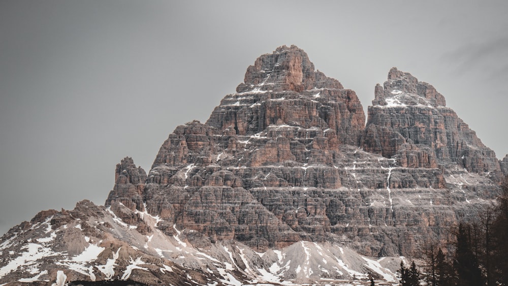 a mountain range with snow on the top of it