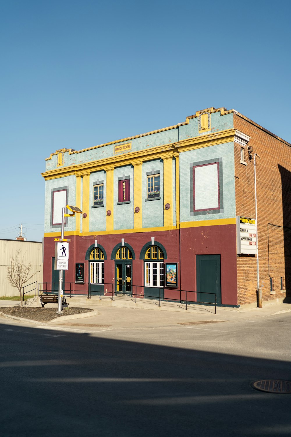 a building with a yellow and red front