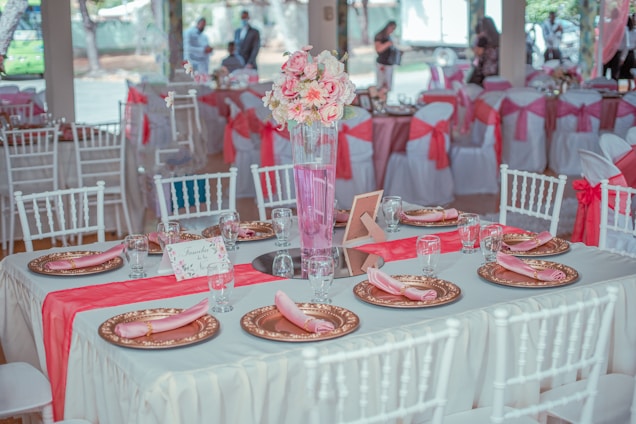 A beautifully arranged banquet table for a wedding event.