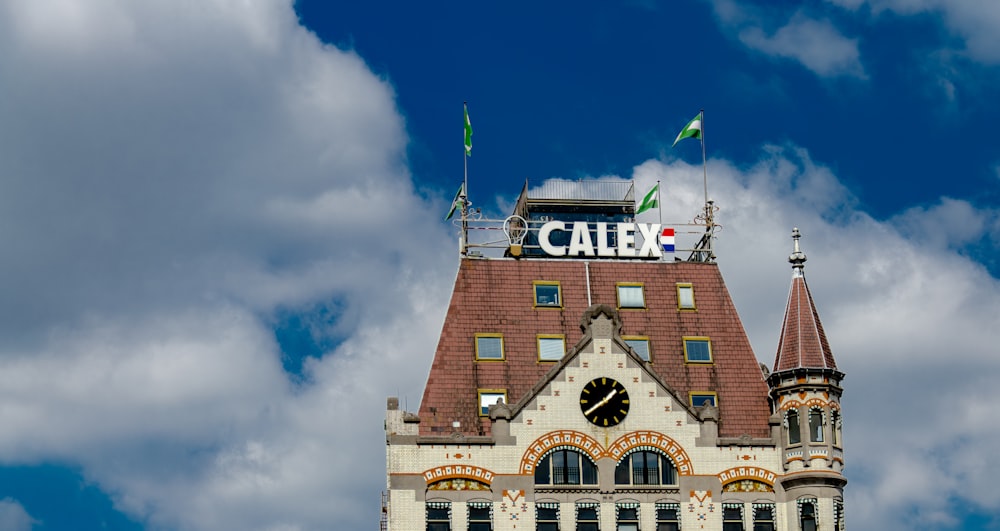 a tall building with a clock on the top of it